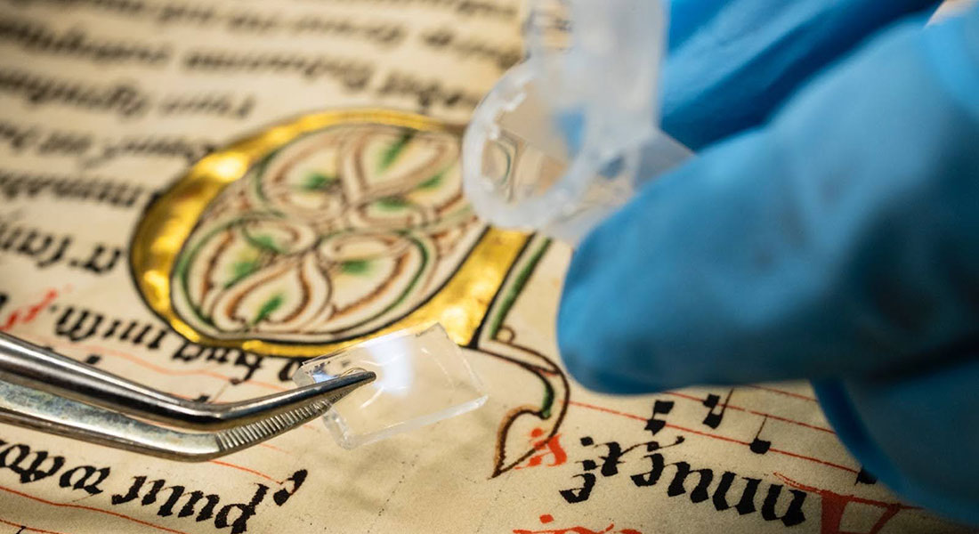 A sample being collected from a medieval manuscript. Photo: CODICUM, University of Bergen